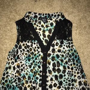Blue cheetah print sleeveless button-down